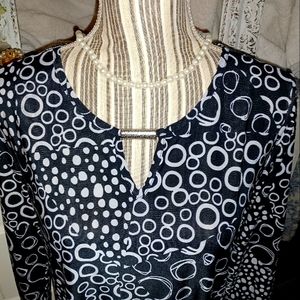ND size Med, Black rayon/spandex with white circles and pot a dot 3/4 sleeve v